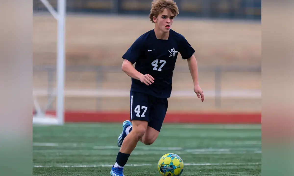 Walker Roberts playing soccer